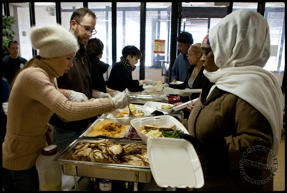 Serving Thanksgiving dinner in the flooded housing project at The Rockaways. © Andrzej Liguz/moreimages.net. Not to be used without permission.
